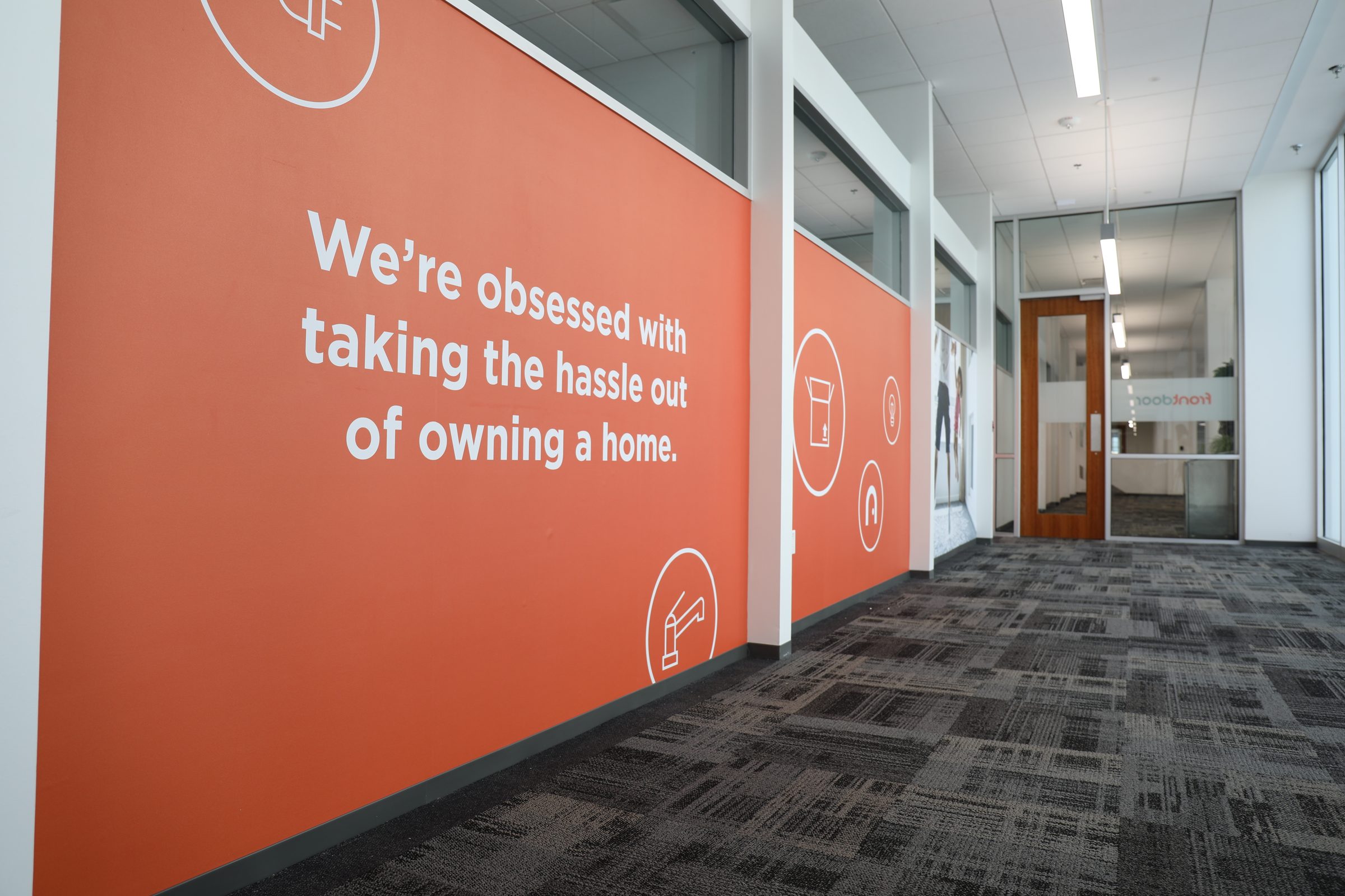 Orange Frontdoor office wall: We are obsessed with taking the hassle out of owning a home